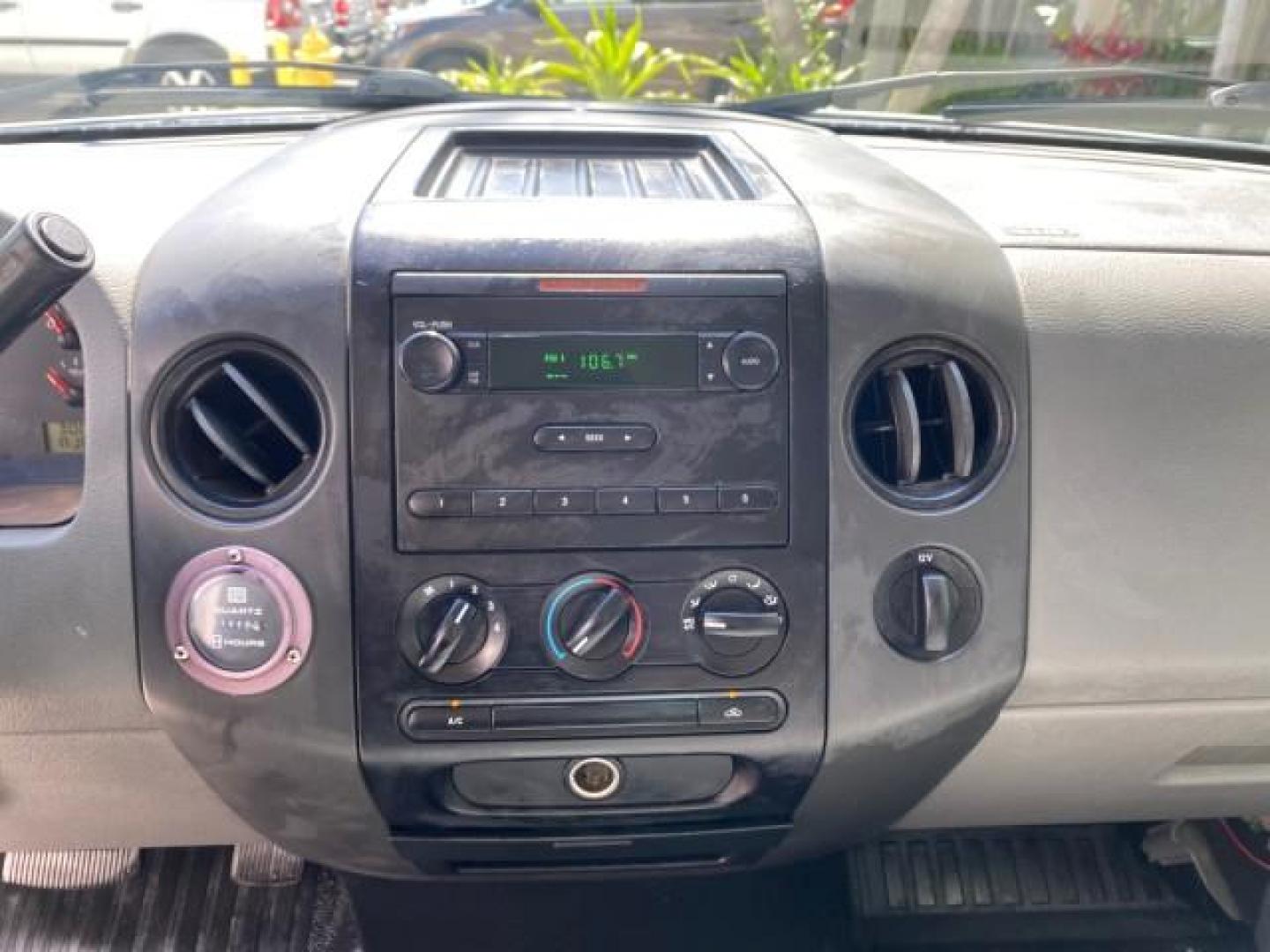 2005 Oxford White /Flint Ford F-150 PU STX LOW MILES 18,931 (1FTRF12215N) with an 4.2L EFI V6 Engine engine, Automatic transmission, located at 4701 North Dixie Hwy, Pompano Beach, FL, 33064, (954) 422-2889, 26.240938, -80.123474 - OUR WEBPAGE FLORIDACARS1.COM HAS OVER 100 PHOTOS AND FREE CARFAX LINK 2005 Ford F-150 STX Pickup 4.2L V6 F OHV Gasoline 20 MPG Rear Wheel Drive Features ABS Brakes Air Conditioning AM/FM Stereo Automatic Transmission Overhead Airbags Side Airbags Traction Control Vinyl Seats 2005 Ford F-150 STX Regu- Photo#55