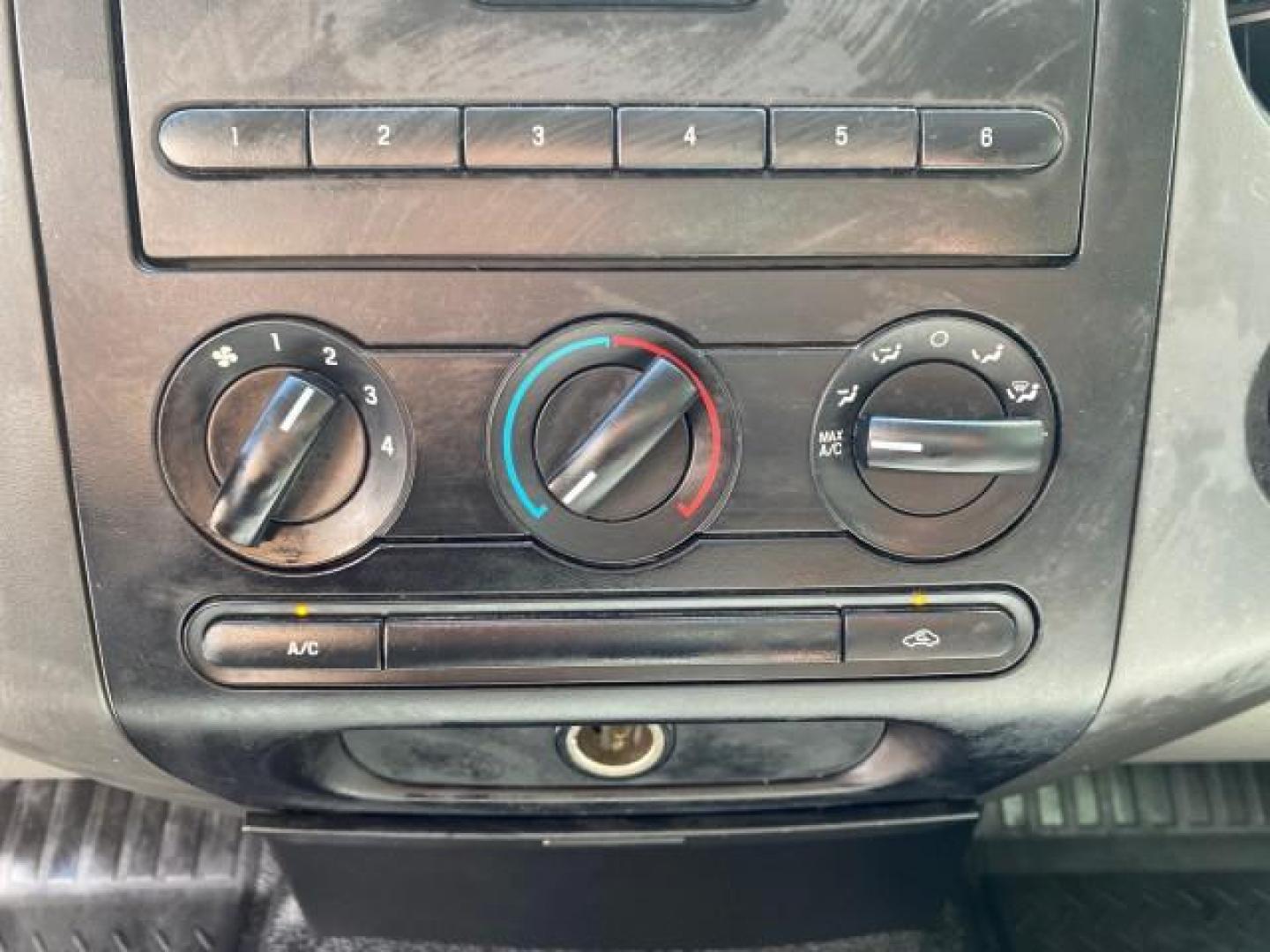 2005 Oxford White /Flint Ford F-150 PU STX LOW MILES 18,931 (1FTRF12215N) with an 4.2L EFI V6 Engine engine, Automatic transmission, located at 4701 North Dixie Hwy, Pompano Beach, FL, 33064, (954) 422-2889, 26.240938, -80.123474 - OUR WEBPAGE FLORIDACARS1.COM HAS OVER 100 PHOTOS AND FREE CARFAX LINK 2005 Ford F-150 STX Pickup 4.2L V6 F OHV Gasoline 20 MPG Rear Wheel Drive Features ABS Brakes Air Conditioning AM/FM Stereo Automatic Transmission Overhead Airbags Side Airbags Traction Control Vinyl Seats 2005 Ford F-150 STX Regu- Photo#57