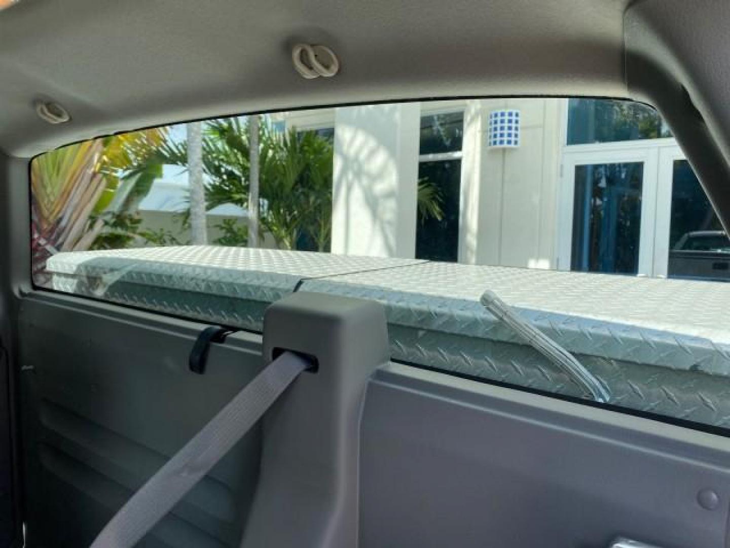 2005 Oxford White /Flint Ford F-150 PU STX LOW MILES 18,931 (1FTRF12215N) with an 4.2L EFI V6 Engine engine, Automatic transmission, located at 4701 North Dixie Hwy, Pompano Beach, FL, 33064, (954) 422-2889, 26.240938, -80.123474 - OUR WEBPAGE FLORIDACARS1.COM HAS OVER 100 PHOTOS AND FREE CARFAX LINK 2005 Ford F-150 STX Pickup 4.2L V6 F OHV Gasoline 20 MPG Rear Wheel Drive Features ABS Brakes Air Conditioning AM/FM Stereo Automatic Transmission Overhead Airbags Side Airbags Traction Control Vinyl Seats 2005 Ford F-150 STX Regu- Photo#70
