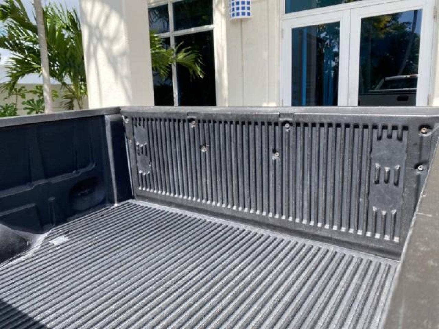2005 Oxford White /Flint Ford F-150 PU STX LOW MILES 18,931 (1FTRF12215N) with an 4.2L EFI V6 Engine engine, Automatic transmission, located at 4701 North Dixie Hwy, Pompano Beach, FL, 33064, (954) 422-2889, 26.240938, -80.123474 - OUR WEBPAGE FLORIDACARS1.COM HAS OVER 100 PHOTOS AND FREE CARFAX LINK 2005 Ford F-150 STX Pickup 4.2L V6 F OHV Gasoline 20 MPG Rear Wheel Drive Features ABS Brakes Air Conditioning AM/FM Stereo Automatic Transmission Overhead Airbags Side Airbags Traction Control Vinyl Seats 2005 Ford F-150 STX Regu- Photo#78