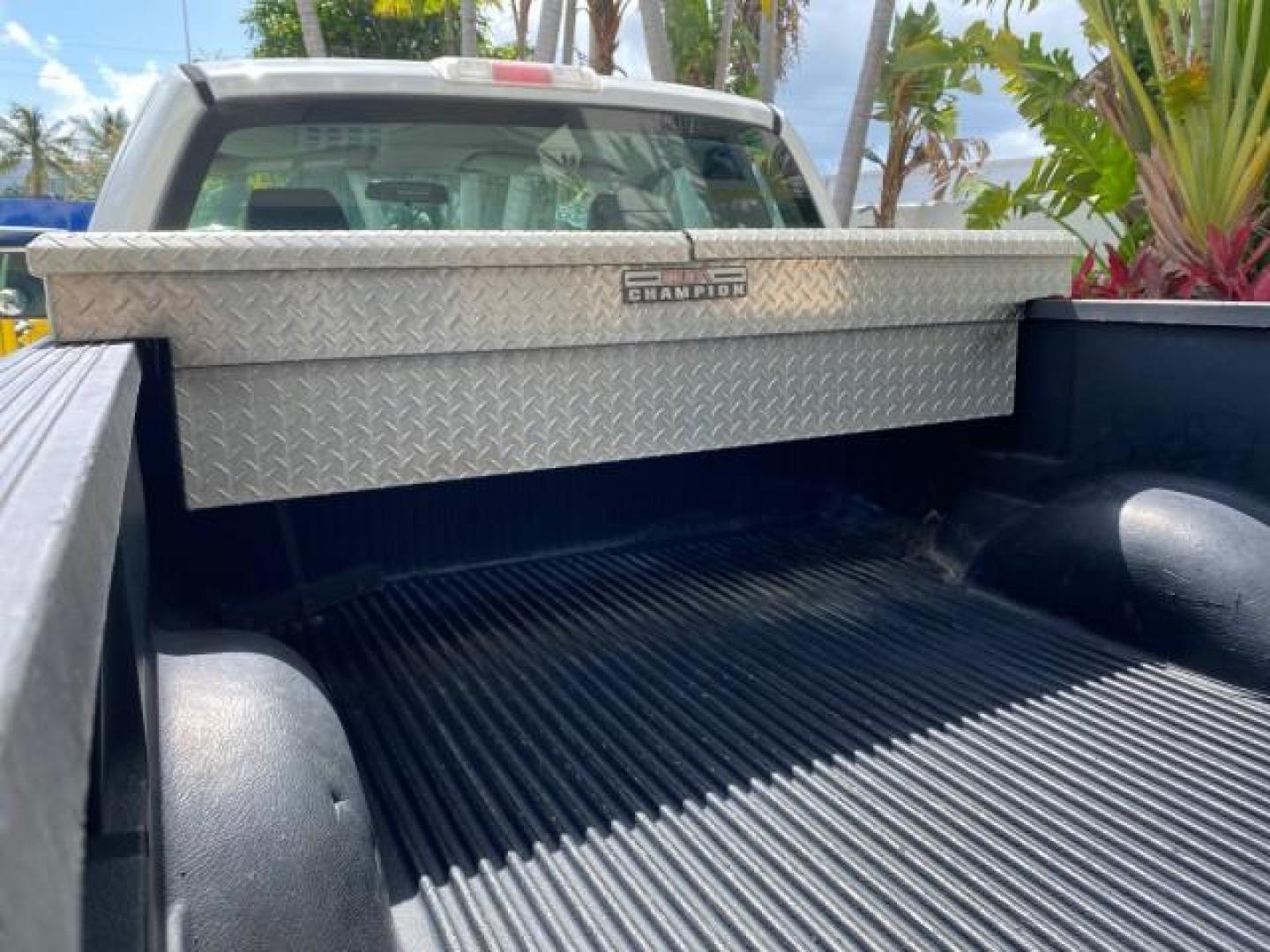 2005 Oxford White /Flint Ford F-150 PU STX LOW MILES 18,931 (1FTRF12215N) with an 4.2L EFI V6 Engine engine, Automatic transmission, located at 4701 North Dixie Hwy, Pompano Beach, FL, 33064, (954) 422-2889, 26.240938, -80.123474 - OUR WEBPAGE FLORIDACARS1.COM HAS OVER 100 PHOTOS AND FREE CARFAX LINK 2005 Ford F-150 STX Pickup 4.2L V6 F OHV Gasoline 20 MPG Rear Wheel Drive Features ABS Brakes Air Conditioning AM/FM Stereo Automatic Transmission Overhead Airbags Side Airbags Traction Control Vinyl Seats 2005 Ford F-150 STX Regu- Photo#82