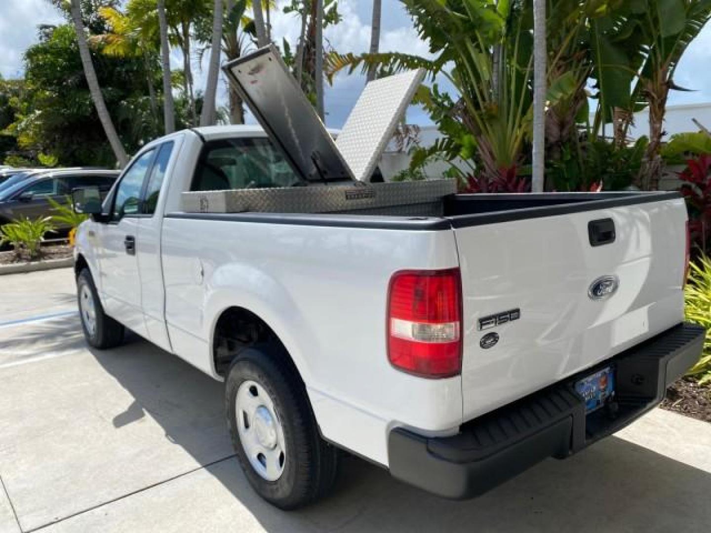 2005 Oxford White /Flint Ford F-150 PU STX LOW MILES 18,931 (1FTRF12215N) with an 4.2L EFI V6 Engine engine, Automatic transmission, located at 4701 North Dixie Hwy, Pompano Beach, FL, 33064, (954) 422-2889, 26.240938, -80.123474 - OUR WEBPAGE FLORIDACARS1.COM HAS OVER 100 PHOTOS AND FREE CARFAX LINK 2005 Ford F-150 STX Pickup 4.2L V6 F OHV Gasoline 20 MPG Rear Wheel Drive Features ABS Brakes Air Conditioning AM/FM Stereo Automatic Transmission Overhead Airbags Side Airbags Traction Control Vinyl Seats 2005 Ford F-150 STX Regu- Photo#83