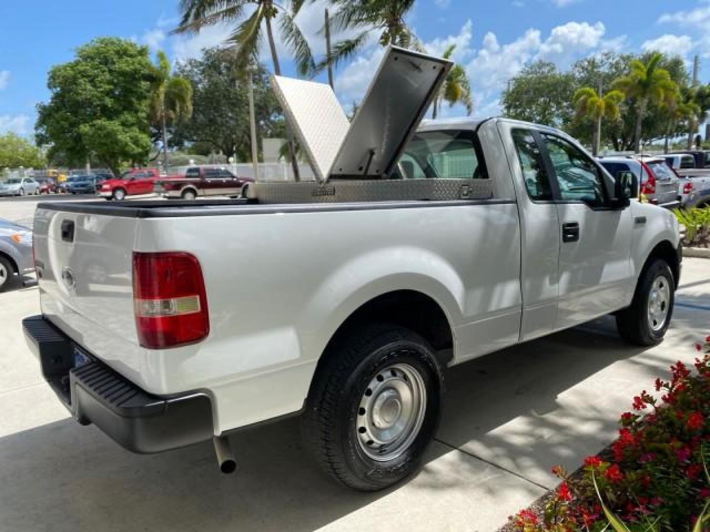2005 Oxford White /Flint Ford F-150 PU STX LOW MILES 18,931 (1FTRF12215N) with an 4.2L EFI V6 Engine engine, Automatic transmission, located at 4701 North Dixie Hwy, Pompano Beach, FL, 33064, (954) 422-2889, 26.240938, -80.123474 - OUR WEBPAGE FLORIDACARS1.COM HAS OVER 100 PHOTOS AND FREE CARFAX LINK 2005 Ford F-150 STX Pickup 4.2L V6 F OHV Gasoline 20 MPG Rear Wheel Drive Features ABS Brakes Air Conditioning AM/FM Stereo Automatic Transmission Overhead Airbags Side Airbags Traction Control Vinyl Seats 2005 Ford F-150 STX Regu- Photo#86