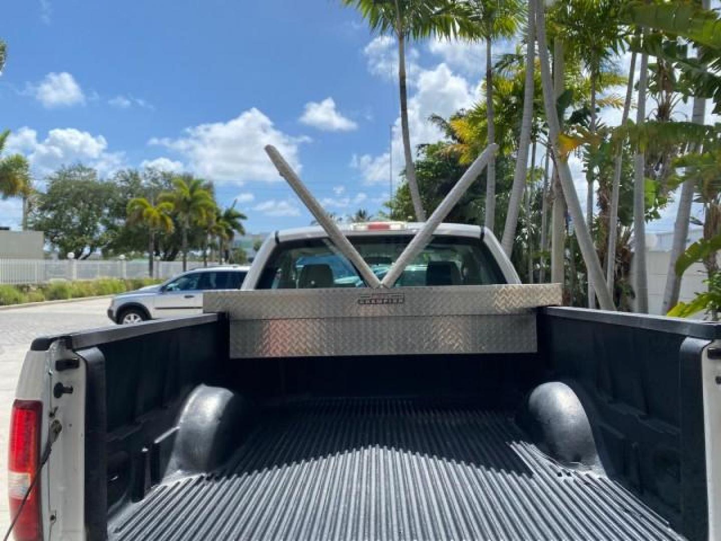 2005 Oxford White /Flint Ford F-150 PU STX LOW MILES 18,931 (1FTRF12215N) with an 4.2L EFI V6 Engine engine, Automatic transmission, located at 4701 North Dixie Hwy, Pompano Beach, FL, 33064, (954) 422-2889, 26.240938, -80.123474 - OUR WEBPAGE FLORIDACARS1.COM HAS OVER 100 PHOTOS AND FREE CARFAX LINK 2005 Ford F-150 STX Pickup 4.2L V6 F OHV Gasoline 20 MPG Rear Wheel Drive Features ABS Brakes Air Conditioning AM/FM Stereo Automatic Transmission Overhead Airbags Side Airbags Traction Control Vinyl Seats 2005 Ford F-150 STX Regu- Photo#87