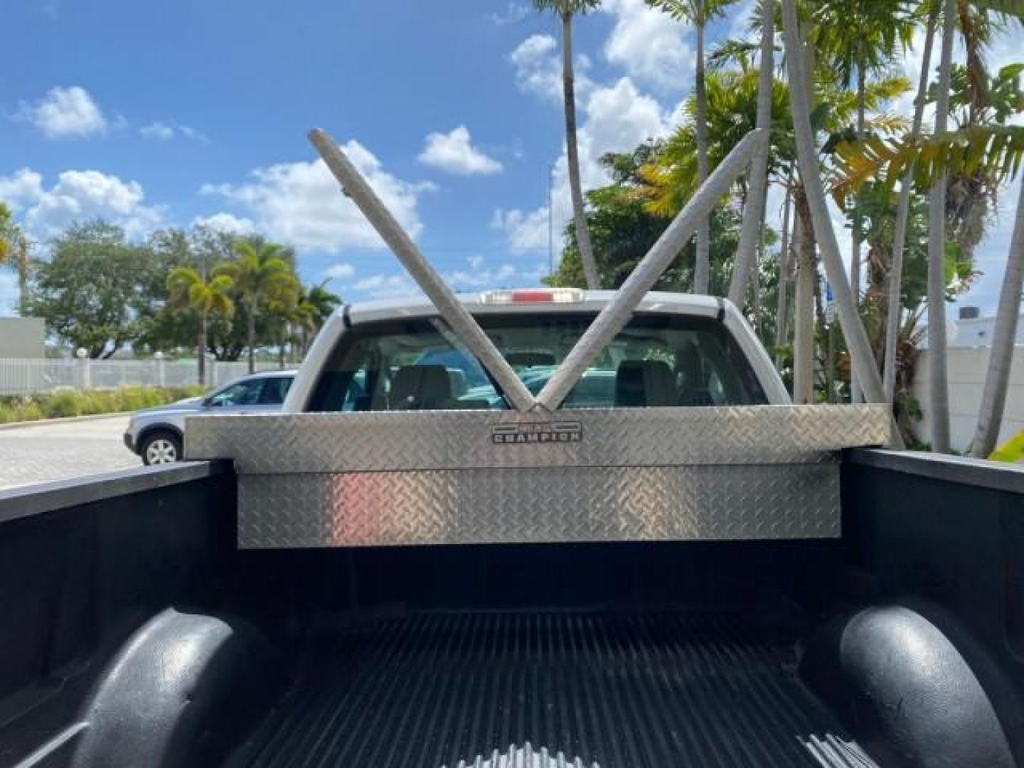 2005 Oxford White /Flint Ford F-150 PU STX LOW MILES 18,931 (1FTRF12215N) with an 4.2L EFI V6 Engine engine, Automatic transmission, located at 4701 North Dixie Hwy, Pompano Beach, FL, 33064, (954) 422-2889, 26.240938, -80.123474 - OUR WEBPAGE FLORIDACARS1.COM HAS OVER 100 PHOTOS AND FREE CARFAX LINK 2005 Ford F-150 STX Pickup 4.2L V6 F OHV Gasoline 20 MPG Rear Wheel Drive Features ABS Brakes Air Conditioning AM/FM Stereo Automatic Transmission Overhead Airbags Side Airbags Traction Control Vinyl Seats 2005 Ford F-150 STX Regu- Photo#88