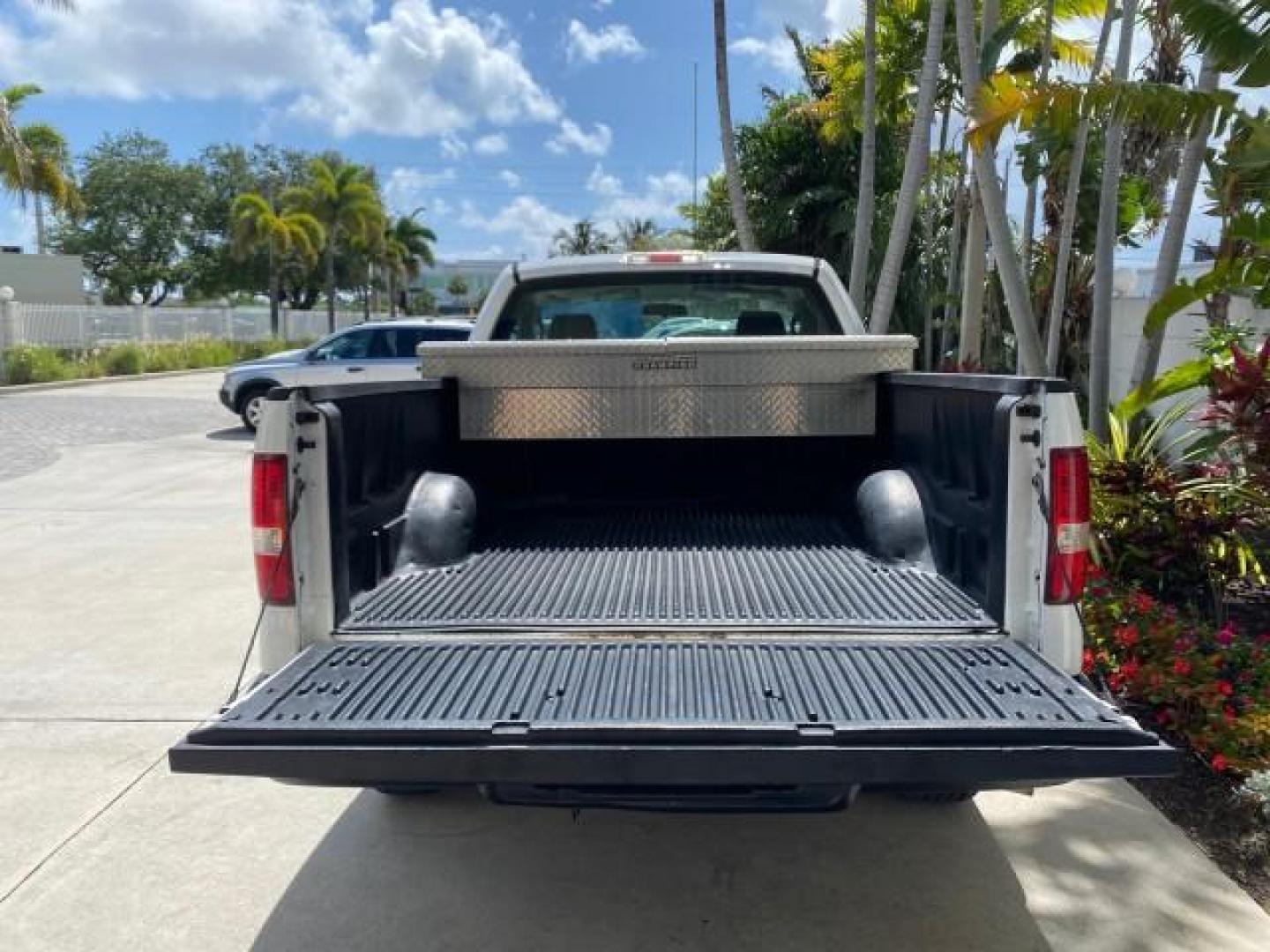 2005 Oxford White /Flint Ford F-150 PU STX LOW MILES 18,931 (1FTRF12215N) with an 4.2L EFI V6 Engine engine, Automatic transmission, located at 4701 North Dixie Hwy, Pompano Beach, FL, 33064, (954) 422-2889, 26.240938, -80.123474 - OUR WEBPAGE FLORIDACARS1.COM HAS OVER 100 PHOTOS AND FREE CARFAX LINK 2005 Ford F-150 STX Pickup 4.2L V6 F OHV Gasoline 20 MPG Rear Wheel Drive Features ABS Brakes Air Conditioning AM/FM Stereo Automatic Transmission Overhead Airbags Side Airbags Traction Control Vinyl Seats 2005 Ford F-150 STX Regu- Photo#96