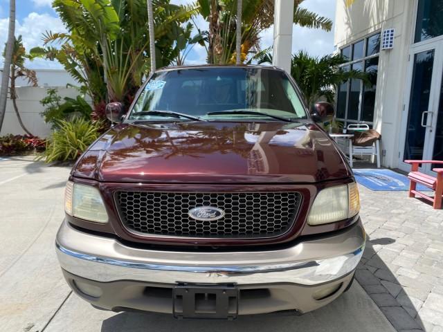 2002 Toreador Red Metallic /Dark Brown Ford F-150 CREW CAB King Ranch LOW MILES 56,886 (1FTRW07L12K) with an 5.4L SEFI OHC V8 Triton Engine engine, Automatic transmission, located at 4701 North Dixie Hwy, Pompano Beach, FL, 33064, (954) 422-2889, 26.240938, -80.123474 - OUR WEBPAGE FLORIDACARS1.COM HAS OVER 100 PHOTOS AND FREE CARFAX LINK 2002 Ford F-150 King Ranch Crew Pickup 5.4L V8 F SOHC 16V Gasoline 19 MPG Rear Wheel Drive Features ABS Brakes Air Conditioning Alloy Wheels AM/FM Stereo Automatic Transmission Bed Liner Cassette Player Cruise Control Leather Seat - Photo#2