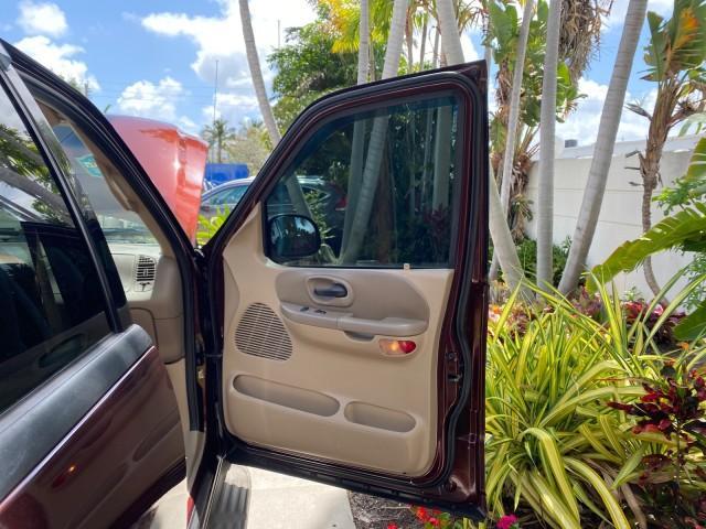 2002 Toreador Red Metallic /Dark Brown Ford F-150 CREW CAB King Ranch LOW MILES 56,886 (1FTRW07L12K) with an 5.4L SEFI OHC V8 Triton Engine engine, Automatic transmission, located at 4701 North Dixie Hwy, Pompano Beach, FL, 33064, (954) 422-2889, 26.240938, -80.123474 - OUR WEBPAGE FLORIDACARS1.COM HAS OVER 100 PHOTOS AND FREE CARFAX LINK 2002 Ford F-150 King Ranch Crew Pickup 5.4L V8 F SOHC 16V Gasoline 19 MPG Rear Wheel Drive Features ABS Brakes Air Conditioning Alloy Wheels AM/FM Stereo Automatic Transmission Bed Liner Cassette Player Cruise Control Leather Seat - Photo#11