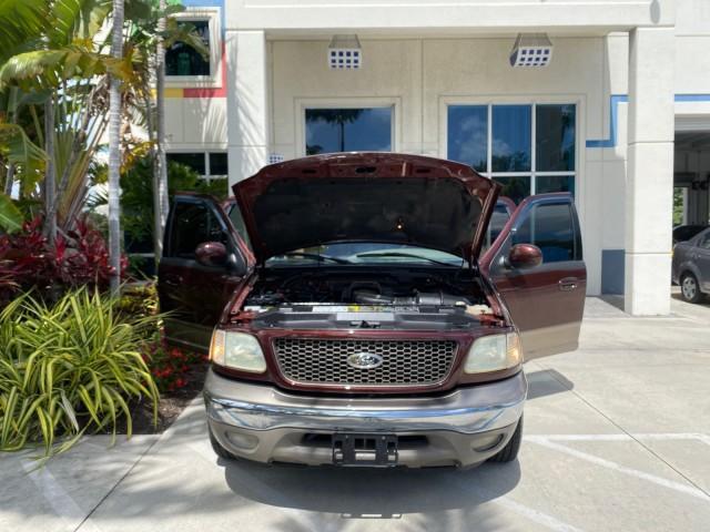 2002 Toreador Red Metallic /Dark Brown Ford F-150 CREW CAB King Ranch LOW MILES 56,886 (1FTRW07L12K) with an 5.4L SEFI OHC V8 Triton Engine engine, Automatic transmission, located at 4701 North Dixie Hwy, Pompano Beach, FL, 33064, (954) 422-2889, 26.240938, -80.123474 - OUR WEBPAGE FLORIDACARS1.COM HAS OVER 100 PHOTOS AND FREE CARFAX LINK 2002 Ford F-150 King Ranch Crew Pickup 5.4L V8 F SOHC 16V Gasoline 19 MPG Rear Wheel Drive Features ABS Brakes Air Conditioning Alloy Wheels AM/FM Stereo Automatic Transmission Bed Liner Cassette Player Cruise Control Leather Seat - Photo#16