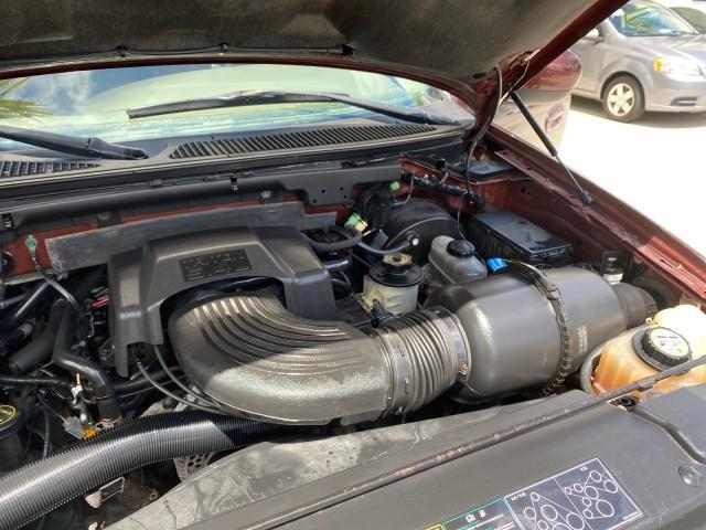 2002 Toreador Red Metallic /Dark Brown Ford F-150 CREW CAB King Ranch LOW MILES 56,886 (1FTRW07L12K) with an 5.4L SEFI OHC V8 Triton Engine engine, Automatic transmission, located at 4701 North Dixie Hwy, Pompano Beach, FL, 33064, (954) 422-2889, 26.240938, -80.123474 - OUR WEBPAGE FLORIDACARS1.COM HAS OVER 100 PHOTOS AND FREE CARFAX LINK 2002 Ford F-150 King Ranch Crew Pickup 5.4L V8 F SOHC 16V Gasoline 19 MPG Rear Wheel Drive Features ABS Brakes Air Conditioning Alloy Wheels AM/FM Stereo Automatic Transmission Bed Liner Cassette Player Cruise Control Leather Seat - Photo#25