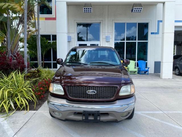 2002 Toreador Red Metallic /Dark Brown Ford F-150 CREW CAB King Ranch LOW MILES 56,886 (1FTRW07L12K) with an 5.4L SEFI OHC V8 Triton Engine engine, Automatic transmission, located at 4701 North Dixie Hwy, Pompano Beach, FL, 33064, (954) 422-2889, 26.240938, -80.123474 - OUR WEBPAGE FLORIDACARS1.COM HAS OVER 100 PHOTOS AND FREE CARFAX LINK 2002 Ford F-150 King Ranch Crew Pickup 5.4L V8 F SOHC 16V Gasoline 19 MPG Rear Wheel Drive Features ABS Brakes Air Conditioning Alloy Wheels AM/FM Stereo Automatic Transmission Bed Liner Cassette Player Cruise Control Leather Seat - Photo#26
