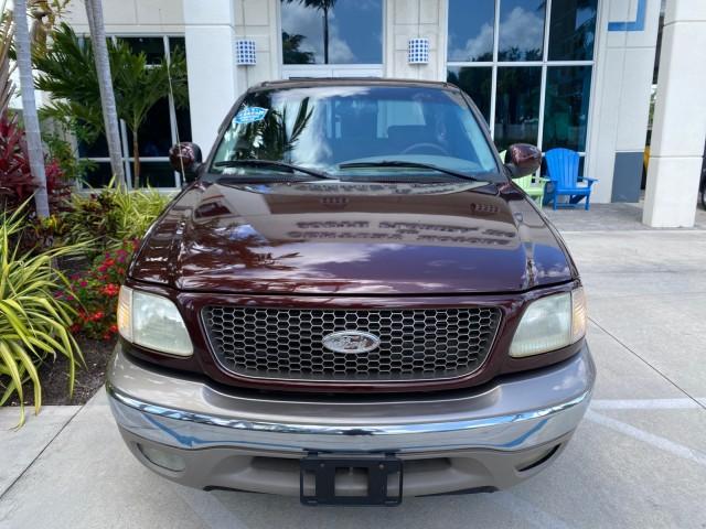 2002 Toreador Red Metallic /Dark Brown Ford F-150 CREW CAB King Ranch LOW MILES 56,886 (1FTRW07L12K) with an 5.4L SEFI OHC V8 Triton Engine engine, Automatic transmission, located at 4701 North Dixie Hwy, Pompano Beach, FL, 33064, (954) 422-2889, 26.240938, -80.123474 - OUR WEBPAGE FLORIDACARS1.COM HAS OVER 100 PHOTOS AND FREE CARFAX LINK 2002 Ford F-150 King Ranch Crew Pickup 5.4L V8 F SOHC 16V Gasoline 19 MPG Rear Wheel Drive Features ABS Brakes Air Conditioning Alloy Wheels AM/FM Stereo Automatic Transmission Bed Liner Cassette Player Cruise Control Leather Seat - Photo#27