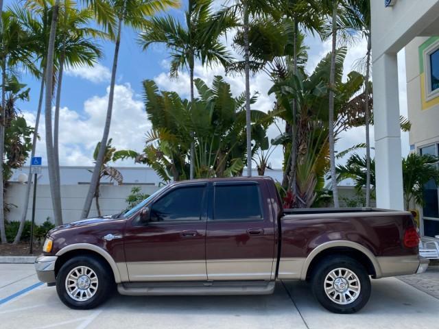 2002 Toreador Red Metallic /Dark Brown Ford F-150 CREW CAB King Ranch LOW MILES 56,886 (1FTRW07L12K) with an 5.4L SEFI OHC V8 Triton Engine engine, Automatic transmission, located at 4701 North Dixie Hwy, Pompano Beach, FL, 33064, (954) 422-2889, 26.240938, -80.123474 - OUR WEBPAGE FLORIDACARS1.COM HAS OVER 100 PHOTOS AND FREE CARFAX LINK 2002 Ford F-150 King Ranch Crew Pickup 5.4L V8 F SOHC 16V Gasoline 19 MPG Rear Wheel Drive Features ABS Brakes Air Conditioning Alloy Wheels AM/FM Stereo Automatic Transmission Bed Liner Cassette Player Cruise Control Leather Seat - Photo#30