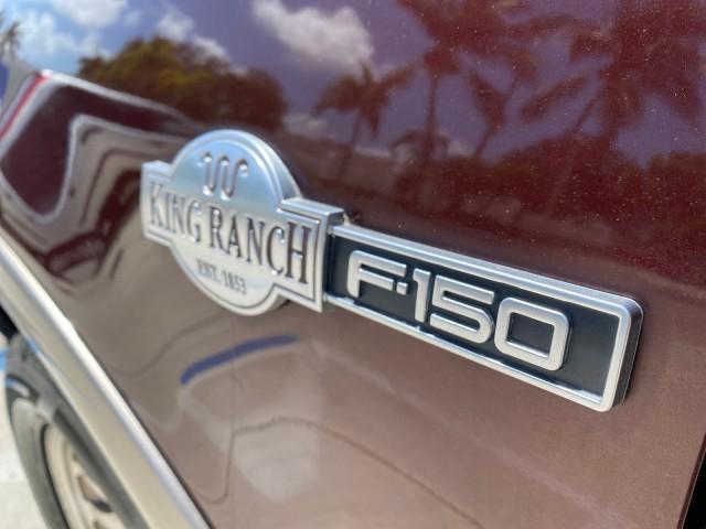 2002 Toreador Red Metallic /Dark Brown Ford F-150 CREW CAB King Ranch LOW MILES 56,886 (1FTRW07L12K) with an 5.4L SEFI OHC V8 Triton Engine engine, Automatic transmission, located at 4701 North Dixie Hwy, Pompano Beach, FL, 33064, (954) 422-2889, 26.240938, -80.123474 - OUR WEBPAGE FLORIDACARS1.COM HAS OVER 100 PHOTOS AND FREE CARFAX LINK 2002 Ford F-150 King Ranch Crew Pickup 5.4L V8 F SOHC 16V Gasoline 19 MPG Rear Wheel Drive Features ABS Brakes Air Conditioning Alloy Wheels AM/FM Stereo Automatic Transmission Bed Liner Cassette Player Cruise Control Leather Seat - Photo#41