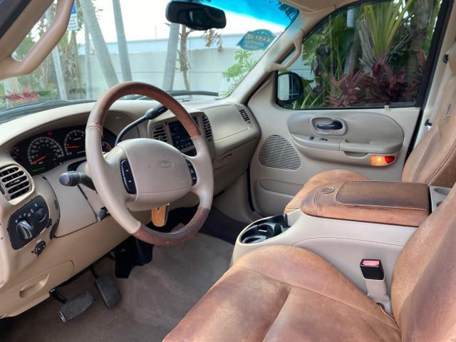 2002 Toreador Red Metallic /Dark Brown Ford F-150 CREW CAB King Ranch LOW MILES 56,886 (1FTRW07L12K) with an 5.4L SEFI OHC V8 Triton Engine engine, Automatic transmission, located at 4701 North Dixie Hwy, Pompano Beach, FL, 33064, (954) 422-2889, 26.240938, -80.123474 - OUR WEBPAGE FLORIDACARS1.COM HAS OVER 100 PHOTOS AND FREE CARFAX LINK 2002 Ford F-150 King Ranch Crew Pickup 5.4L V8 F SOHC 16V Gasoline 19 MPG Rear Wheel Drive Features ABS Brakes Air Conditioning Alloy Wheels AM/FM Stereo Automatic Transmission Bed Liner Cassette Player Cruise Control Leather Seat - Photo#47