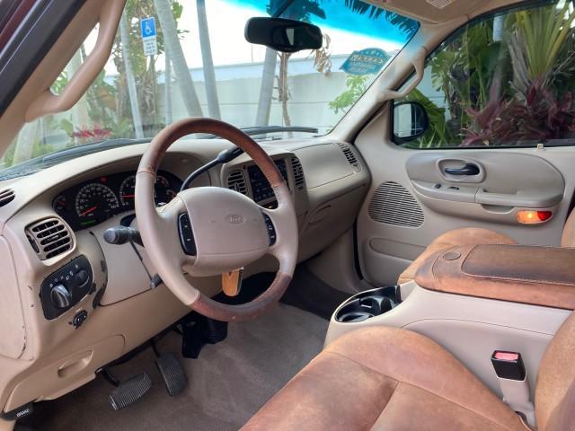 2002 Toreador Red Metallic /Dark Brown Ford F-150 CREW CAB King Ranch LOW MILES 56,886 (1FTRW07L12K) with an 5.4L SEFI OHC V8 Triton Engine engine, Automatic transmission, located at 4701 North Dixie Hwy, Pompano Beach, FL, 33064, (954) 422-2889, 26.240938, -80.123474 - OUR WEBPAGE FLORIDACARS1.COM HAS OVER 100 PHOTOS AND FREE CARFAX LINK 2002 Ford F-150 King Ranch Crew Pickup 5.4L V8 F SOHC 16V Gasoline 19 MPG Rear Wheel Drive Features ABS Brakes Air Conditioning Alloy Wheels AM/FM Stereo Automatic Transmission Bed Liner Cassette Player Cruise Control Leather Seat - Photo#48