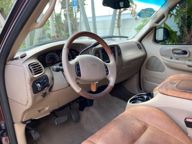 2002 Toreador Red Metallic /Dark Brown Ford F-150 CREW CAB King Ranch LOW MILES 56,886 (1FTRW07L12K) with an 5.4L SEFI OHC V8 Triton Engine engine, Automatic transmission, located at 4701 North Dixie Hwy, Pompano Beach, FL, 33064, (954) 422-2889, 26.240938, -80.123474 - OUR WEBPAGE FLORIDACARS1.COM HAS OVER 100 PHOTOS AND FREE CARFAX LINK 2002 Ford F-150 King Ranch Crew Pickup 5.4L V8 F SOHC 16V Gasoline 19 MPG Rear Wheel Drive Features ABS Brakes Air Conditioning Alloy Wheels AM/FM Stereo Automatic Transmission Bed Liner Cassette Player Cruise Control Leather Seat - Photo#49