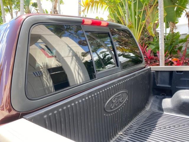 2002 Toreador Red Metallic /Dark Brown Ford F-150 CREW CAB King Ranch LOW MILES 56,886 (1FTRW07L12K) with an 5.4L SEFI OHC V8 Triton Engine engine, Automatic transmission, located at 4701 North Dixie Hwy, Pompano Beach, FL, 33064, (954) 422-2889, 26.240938, -80.123474 - OUR WEBPAGE FLORIDACARS1.COM HAS OVER 100 PHOTOS AND FREE CARFAX LINK 2002 Ford F-150 King Ranch Crew Pickup 5.4L V8 F SOHC 16V Gasoline 19 MPG Rear Wheel Drive Features ABS Brakes Air Conditioning Alloy Wheels AM/FM Stereo Automatic Transmission Bed Liner Cassette Player Cruise Control Leather Seat - Photo#86