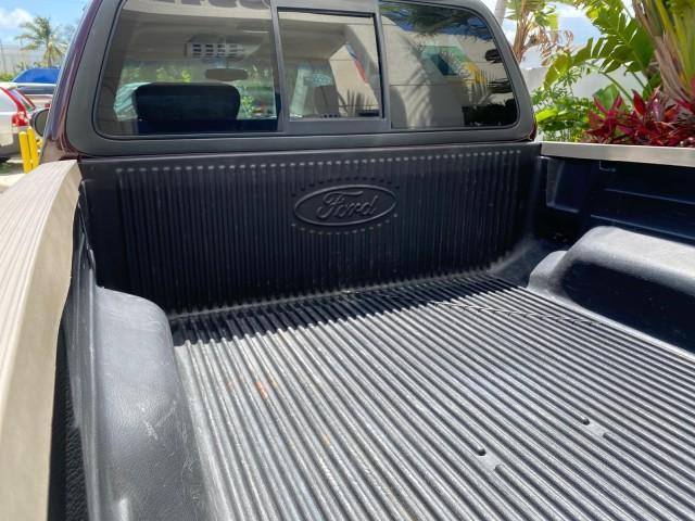 2002 Toreador Red Metallic /Dark Brown Ford F-150 CREW CAB King Ranch LOW MILES 56,886 (1FTRW07L12K) with an 5.4L SEFI OHC V8 Triton Engine engine, Automatic transmission, located at 4701 North Dixie Hwy, Pompano Beach, FL, 33064, (954) 422-2889, 26.240938, -80.123474 - OUR WEBPAGE FLORIDACARS1.COM HAS OVER 100 PHOTOS AND FREE CARFAX LINK 2002 Ford F-150 King Ranch Crew Pickup 5.4L V8 F SOHC 16V Gasoline 19 MPG Rear Wheel Drive Features ABS Brakes Air Conditioning Alloy Wheels AM/FM Stereo Automatic Transmission Bed Liner Cassette Player Cruise Control Leather Seat - Photo#92