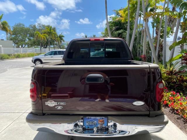 2002 Toreador Red Metallic /Dark Brown Ford F-150 CREW CAB King Ranch LOW MILES 56,886 (1FTRW07L12K) with an 5.4L SEFI OHC V8 Triton Engine engine, Automatic transmission, located at 4701 North Dixie Hwy, Pompano Beach, FL, 33064, (954) 422-2889, 26.240938, -80.123474 - OUR WEBPAGE FLORIDACARS1.COM HAS OVER 100 PHOTOS AND FREE CARFAX LINK 2002 Ford F-150 King Ranch Crew Pickup 5.4L V8 F SOHC 16V Gasoline 19 MPG Rear Wheel Drive Features ABS Brakes Air Conditioning Alloy Wheels AM/FM Stereo Automatic Transmission Bed Liner Cassette Player Cruise Control Leather Seat - Photo#95