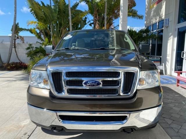 2008 Pueblo Gold Metallic /Tan Ford F-150 4WD Lariat 1 OWNER LOW MILES 83,919 (1FTPX14V58F) with an 5.4L 24-Valve EFI FFV V8 Engine engine, Automatic transmission, located at 4701 North Dixie Hwy, Pompano Beach, FL, 33064, (954) 422-2889, 26.240938, -80.123474 - OUR WEBPAGE FLORIDACARS1.COM HAS OVER 100 PHOTOS AND FREE CARFAX LINK 2008 Ford F-150 Lariat 1 OWNER 4 Door Extended Cab Pickup 5.4L V8 F SOHC Flex Fuel 17 MPG Rear Wheel Drive w/ 4X4 Features 4WD/AWD ABS Brakes Air Conditioning Alloy Wheels AM/FM Stereo Automatic Transmission Auxiliary Audio Input - Photo#1