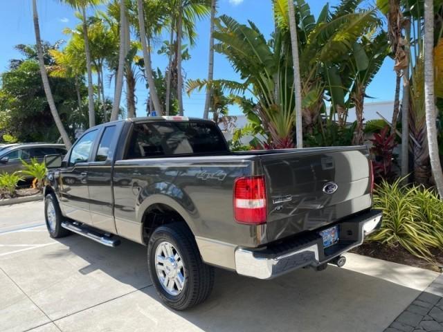 2008 Pueblo Gold Metallic /Tan Ford F-150 4WD Lariat 1 OWNER LOW MILES 83,919 (1FTPX14V58F) with an 5.4L 24-Valve EFI FFV V8 Engine engine, Automatic transmission, located at 4701 North Dixie Hwy, Pompano Beach, FL, 33064, (954) 422-2889, 26.240938, -80.123474 - OUR WEBPAGE FLORIDACARS1.COM HAS OVER 100 PHOTOS AND FREE CARFAX LINK 2008 Ford F-150 Lariat 1 OWNER 4 Door Extended Cab Pickup 5.4L V8 F SOHC Flex Fuel 17 MPG Rear Wheel Drive w/ 4X4 Features 4WD/AWD ABS Brakes Air Conditioning Alloy Wheels AM/FM Stereo Automatic Transmission Auxiliary Audio Input - Photo#5