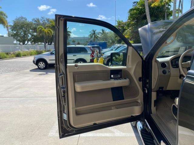 2008 Pueblo Gold Metallic /Tan Ford F-150 4WD Lariat 1 OWNER LOW MILES 83,919 (1FTPX14V58F) with an 5.4L 24-Valve EFI FFV V8 Engine engine, Automatic transmission, located at 4701 North Dixie Hwy, Pompano Beach, FL, 33064, (954) 422-2889, 26.240938, -80.123474 - OUR WEBPAGE FLORIDACARS1.COM HAS OVER 100 PHOTOS AND FREE CARFAX LINK 2008 Ford F-150 Lariat 1 OWNER 4 Door Extended Cab Pickup 5.4L V8 F SOHC Flex Fuel 17 MPG Rear Wheel Drive w/ 4X4 Features 4WD/AWD ABS Brakes Air Conditioning Alloy Wheels AM/FM Stereo Automatic Transmission Auxiliary Audio Input - Photo#9