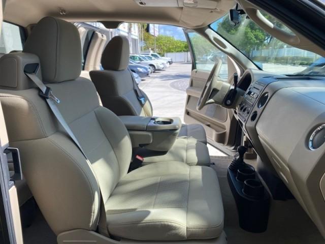 2008 Pueblo Gold Metallic /Tan Ford F-150 4WD Lariat 1 OWNER LOW MILES 83,919 (1FTPX14V58F) with an 5.4L 24-Valve EFI FFV V8 Engine engine, Automatic transmission, located at 4701 North Dixie Hwy, Pompano Beach, FL, 33064, (954) 422-2889, 26.240938, -80.123474 - OUR WEBPAGE FLORIDACARS1.COM HAS OVER 100 PHOTOS AND FREE CARFAX LINK 2008 Ford F-150 Lariat 1 OWNER 4 Door Extended Cab Pickup 5.4L V8 F SOHC Flex Fuel 17 MPG Rear Wheel Drive w/ 4X4 Features 4WD/AWD ABS Brakes Air Conditioning Alloy Wheels AM/FM Stereo Automatic Transmission Auxiliary Audio Input - Photo#12