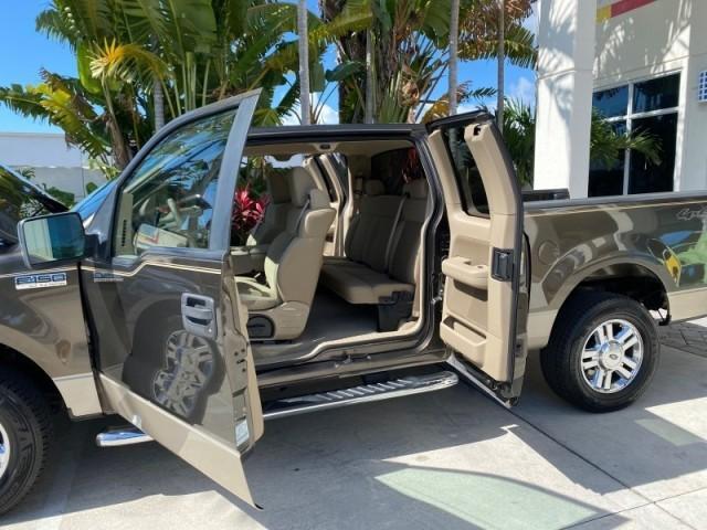 2008 Pueblo Gold Metallic /Tan Ford F-150 4WD Lariat 1 OWNER LOW MILES 83,919 (1FTPX14V58F) with an 5.4L 24-Valve EFI FFV V8 Engine engine, Automatic transmission, located at 4701 North Dixie Hwy, Pompano Beach, FL, 33064, (954) 422-2889, 26.240938, -80.123474 - OUR WEBPAGE FLORIDACARS1.COM HAS OVER 100 PHOTOS AND FREE CARFAX LINK 2008 Ford F-150 Lariat 1 OWNER 4 Door Extended Cab Pickup 5.4L V8 F SOHC Flex Fuel 17 MPG Rear Wheel Drive w/ 4X4 Features 4WD/AWD ABS Brakes Air Conditioning Alloy Wheels AM/FM Stereo Automatic Transmission Auxiliary Audio Input - Photo#13