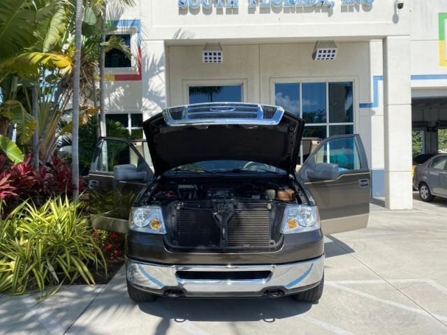 2008 Pueblo Gold Metallic /Tan Ford F-150 4WD Lariat 1 OWNER LOW MILES 83,919 (1FTPX14V58F) with an 5.4L 24-Valve EFI FFV V8 Engine engine, Automatic transmission, located at 4701 North Dixie Hwy, Pompano Beach, FL, 33064, (954) 422-2889, 26.240938, -80.123474 - OUR WEBPAGE FLORIDACARS1.COM HAS OVER 100 PHOTOS AND FREE CARFAX LINK 2008 Ford F-150 Lariat 1 OWNER 4 Door Extended Cab Pickup 5.4L V8 F SOHC Flex Fuel 17 MPG Rear Wheel Drive w/ 4X4 Features 4WD/AWD ABS Brakes Air Conditioning Alloy Wheels AM/FM Stereo Automatic Transmission Auxiliary Audio Input - Photo#16