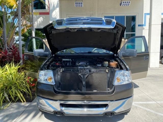 2008 Pueblo Gold Metallic /Tan Ford F-150 4WD Lariat 1 OWNER LOW MILES 83,919 (1FTPX14V58F) with an 5.4L 24-Valve EFI FFV V8 Engine engine, Automatic transmission, located at 4701 North Dixie Hwy, Pompano Beach, FL, 33064, (954) 422-2889, 26.240938, -80.123474 - OUR WEBPAGE FLORIDACARS1.COM HAS OVER 100 PHOTOS AND FREE CARFAX LINK 2008 Ford F-150 Lariat 1 OWNER 4 Door Extended Cab Pickup 5.4L V8 F SOHC Flex Fuel 17 MPG Rear Wheel Drive w/ 4X4 Features 4WD/AWD ABS Brakes Air Conditioning Alloy Wheels AM/FM Stereo Automatic Transmission Auxiliary Audio Input - Photo#17