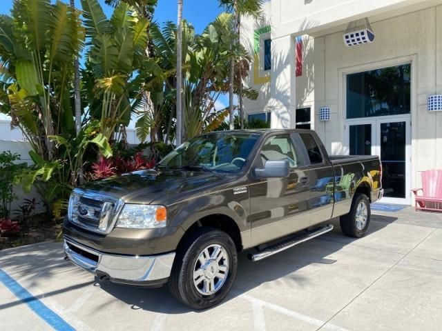 2008 Pueblo Gold Metallic /Tan Ford F-150 4WD Lariat 1 OWNER LOW MILES 83,919 (1FTPX14V58F) with an 5.4L 24-Valve EFI FFV V8 Engine engine, Automatic transmission, located at 4701 North Dixie Hwy, Pompano Beach, FL, 33064, (954) 422-2889, 26.240938, -80.123474 - OUR WEBPAGE FLORIDACARS1.COM HAS OVER 100 PHOTOS AND FREE CARFAX LINK 2008 Ford F-150 Lariat 1 OWNER 4 Door Extended Cab Pickup 5.4L V8 F SOHC Flex Fuel 17 MPG Rear Wheel Drive w/ 4X4 Features 4WD/AWD ABS Brakes Air Conditioning Alloy Wheels AM/FM Stereo Automatic Transmission Auxiliary Audio Input - Photo#28