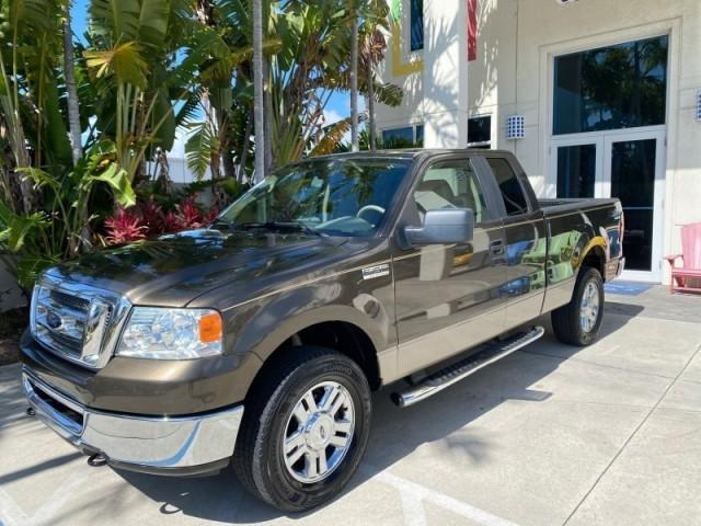 2008 Pueblo Gold Metallic /Tan Ford F-150 4WD Lariat 1 OWNER LOW MILES 83,919 (1FTPX14V58F) with an 5.4L 24-Valve EFI FFV V8 Engine engine, Automatic transmission, located at 4701 North Dixie Hwy, Pompano Beach, FL, 33064, (954) 422-2889, 26.240938, -80.123474 - OUR WEBPAGE FLORIDACARS1.COM HAS OVER 100 PHOTOS AND FREE CARFAX LINK 2008 Ford F-150 Lariat 1 OWNER 4 Door Extended Cab Pickup 5.4L V8 F SOHC Flex Fuel 17 MPG Rear Wheel Drive w/ 4X4 Features 4WD/AWD ABS Brakes Air Conditioning Alloy Wheels AM/FM Stereo Automatic Transmission Auxiliary Audio Input - Photo#29