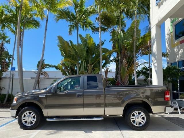 2008 Pueblo Gold Metallic /Tan Ford F-150 4WD Lariat 1 OWNER LOW MILES 83,919 (1FTPX14V58F) with an 5.4L 24-Valve EFI FFV V8 Engine engine, Automatic transmission, located at 4701 North Dixie Hwy, Pompano Beach, FL, 33064, (954) 422-2889, 26.240938, -80.123474 - OUR WEBPAGE FLORIDACARS1.COM HAS OVER 100 PHOTOS AND FREE CARFAX LINK 2008 Ford F-150 Lariat 1 OWNER 4 Door Extended Cab Pickup 5.4L V8 F SOHC Flex Fuel 17 MPG Rear Wheel Drive w/ 4X4 Features 4WD/AWD ABS Brakes Air Conditioning Alloy Wheels AM/FM Stereo Automatic Transmission Auxiliary Audio Input - Photo#31
