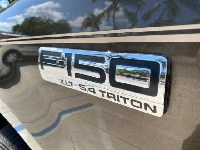 2008 Pueblo Gold Metallic /Tan Ford F-150 4WD Lariat 1 OWNER LOW MILES 83,919 (1FTPX14V58F) with an 5.4L 24-Valve EFI FFV V8 Engine engine, Automatic transmission, located at 4701 North Dixie Hwy, Pompano Beach, FL, 33064, (954) 422-2889, 26.240938, -80.123474 - OUR WEBPAGE FLORIDACARS1.COM HAS OVER 100 PHOTOS AND FREE CARFAX LINK 2008 Ford F-150 Lariat 1 OWNER 4 Door Extended Cab Pickup 5.4L V8 F SOHC Flex Fuel 17 MPG Rear Wheel Drive w/ 4X4 Features 4WD/AWD ABS Brakes Air Conditioning Alloy Wheels AM/FM Stereo Automatic Transmission Auxiliary Audio Input - Photo#42
