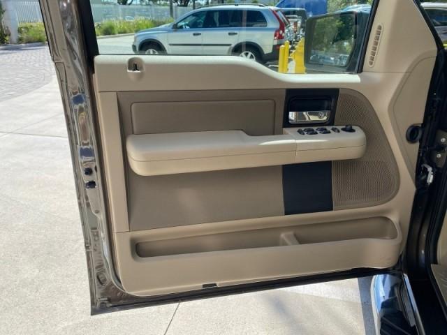 2008 Pueblo Gold Metallic /Tan Ford F-150 4WD Lariat 1 OWNER LOW MILES 83,919 (1FTPX14V58F) with an 5.4L 24-Valve EFI FFV V8 Engine engine, Automatic transmission, located at 4701 North Dixie Hwy, Pompano Beach, FL, 33064, (954) 422-2889, 26.240938, -80.123474 - OUR WEBPAGE FLORIDACARS1.COM HAS OVER 100 PHOTOS AND FREE CARFAX LINK 2008 Ford F-150 Lariat 1 OWNER 4 Door Extended Cab Pickup 5.4L V8 F SOHC Flex Fuel 17 MPG Rear Wheel Drive w/ 4X4 Features 4WD/AWD ABS Brakes Air Conditioning Alloy Wheels AM/FM Stereo Automatic Transmission Auxiliary Audio Input - Photo#43