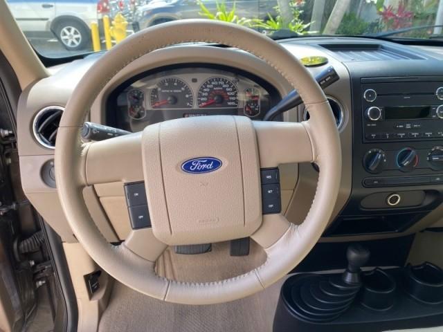 2008 Pueblo Gold Metallic /Tan Ford F-150 4WD Lariat 1 OWNER LOW MILES 83,919 (1FTPX14V58F) with an 5.4L 24-Valve EFI FFV V8 Engine engine, Automatic transmission, located at 4701 North Dixie Hwy, Pompano Beach, FL, 33064, (954) 422-2889, 26.240938, -80.123474 - OUR WEBPAGE FLORIDACARS1.COM HAS OVER 100 PHOTOS AND FREE CARFAX LINK 2008 Ford F-150 Lariat 1 OWNER 4 Door Extended Cab Pickup 5.4L V8 F SOHC Flex Fuel 17 MPG Rear Wheel Drive w/ 4X4 Features 4WD/AWD ABS Brakes Air Conditioning Alloy Wheels AM/FM Stereo Automatic Transmission Auxiliary Audio Input - Photo#49