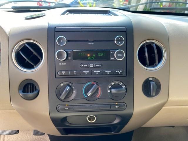 2008 Pueblo Gold Metallic /Tan Ford F-150 4WD Lariat 1 OWNER LOW MILES 83,919 (1FTPX14V58F) with an 5.4L 24-Valve EFI FFV V8 Engine engine, Automatic transmission, located at 4701 North Dixie Hwy, Pompano Beach, FL, 33064, (954) 422-2889, 26.240938, -80.123474 - OUR WEBPAGE FLORIDACARS1.COM HAS OVER 100 PHOTOS AND FREE CARFAX LINK 2008 Ford F-150 Lariat 1 OWNER 4 Door Extended Cab Pickup 5.4L V8 F SOHC Flex Fuel 17 MPG Rear Wheel Drive w/ 4X4 Features 4WD/AWD ABS Brakes Air Conditioning Alloy Wheels AM/FM Stereo Automatic Transmission Auxiliary Audio Input - Photo#59