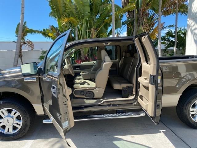2008 Pueblo Gold Metallic /Tan Ford F-150 4WD Lariat 1 OWNER LOW MILES 83,919 (1FTPX14V58F) with an 5.4L 24-Valve EFI FFV V8 Engine engine, Automatic transmission, located at 4701 North Dixie Hwy, Pompano Beach, FL, 33064, (954) 422-2889, 26.240938, -80.123474 - OUR WEBPAGE FLORIDACARS1.COM HAS OVER 100 PHOTOS AND FREE CARFAX LINK 2008 Ford F-150 Lariat 1 OWNER 4 Door Extended Cab Pickup 5.4L V8 F SOHC Flex Fuel 17 MPG Rear Wheel Drive w/ 4X4 Features 4WD/AWD ABS Brakes Air Conditioning Alloy Wheels AM/FM Stereo Automatic Transmission Auxiliary Audio Input - Photo#75