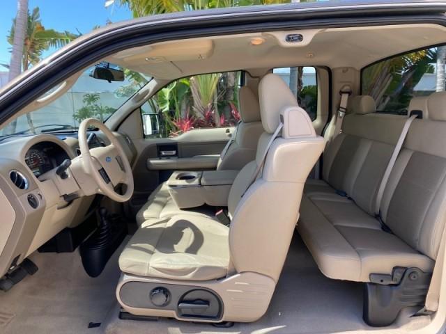 2008 Pueblo Gold Metallic /Tan Ford F-150 4WD Lariat 1 OWNER LOW MILES 83,919 (1FTPX14V58F) with an 5.4L 24-Valve EFI FFV V8 Engine engine, Automatic transmission, located at 4701 North Dixie Hwy, Pompano Beach, FL, 33064, (954) 422-2889, 26.240938, -80.123474 - OUR WEBPAGE FLORIDACARS1.COM HAS OVER 100 PHOTOS AND FREE CARFAX LINK 2008 Ford F-150 Lariat 1 OWNER 4 Door Extended Cab Pickup 5.4L V8 F SOHC Flex Fuel 17 MPG Rear Wheel Drive w/ 4X4 Features 4WD/AWD ABS Brakes Air Conditioning Alloy Wheels AM/FM Stereo Automatic Transmission Auxiliary Audio Input - Photo#78