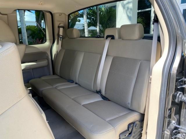 2008 Pueblo Gold Metallic /Tan Ford F-150 4WD Lariat 1 OWNER LOW MILES 83,919 (1FTPX14V58F) with an 5.4L 24-Valve EFI FFV V8 Engine engine, Automatic transmission, located at 4701 North Dixie Hwy, Pompano Beach, FL, 33064, (954) 422-2889, 26.240938, -80.123474 - OUR WEBPAGE FLORIDACARS1.COM HAS OVER 100 PHOTOS AND FREE CARFAX LINK 2008 Ford F-150 Lariat 1 OWNER 4 Door Extended Cab Pickup 5.4L V8 F SOHC Flex Fuel 17 MPG Rear Wheel Drive w/ 4X4 Features 4WD/AWD ABS Brakes Air Conditioning Alloy Wheels AM/FM Stereo Automatic Transmission Auxiliary Audio Input - Photo#79