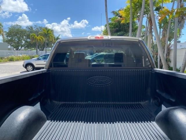 2008 Pueblo Gold Metallic /Tan Ford F-150 4WD Lariat 1 OWNER LOW MILES 83,919 (1FTPX14V58F) with an 5.4L 24-Valve EFI FFV V8 Engine engine, Automatic transmission, located at 4701 North Dixie Hwy, Pompano Beach, FL, 33064, (954) 422-2889, 26.240938, -80.123474 - OUR WEBPAGE FLORIDACARS1.COM HAS OVER 100 PHOTOS AND FREE CARFAX LINK 2008 Ford F-150 Lariat 1 OWNER 4 Door Extended Cab Pickup 5.4L V8 F SOHC Flex Fuel 17 MPG Rear Wheel Drive w/ 4X4 Features 4WD/AWD ABS Brakes Air Conditioning Alloy Wheels AM/FM Stereo Automatic Transmission Auxiliary Audio Input - Photo#95