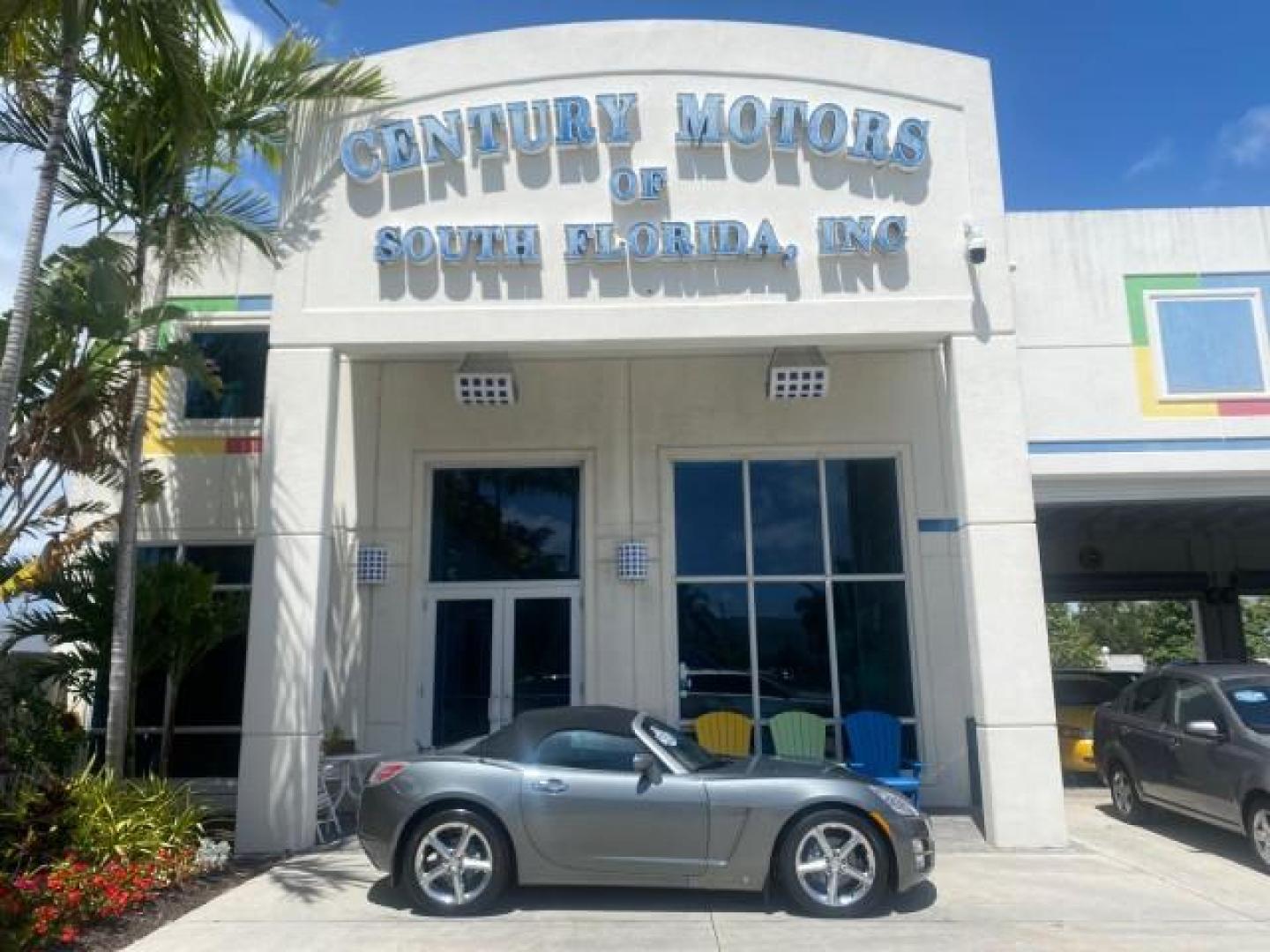 2007 Silver Graphite /Black Saturn Sky CONV LOW MILES 42,288 1 OWNER (1G8MB35B47Y) with an 2.4L DOHC VVT I4 Aluminum Ecotec Engine engine, Automatic transmission, located at 4701 North Dixie Hwy, Pompano Beach, FL, 33064, (954) 422-2889, 26.240938, -80.123474 - OUR WEBPAGE FLORIDACARS1.COM HAS OVER 100 PHOTOS AND FREE CARFAX LINK 2007 Saturn SKY 1 OWNER Convertible 2.4L I4 F DOHC Gasoline 28 MPG Rear Wheel Drive Features ABS Brakes Air Conditioning Alloy Wheels AM/FM Stereo Automatic Transmission Auxiliary Audio Input CD Audio Cruise Control Leather Seats - Photo#0