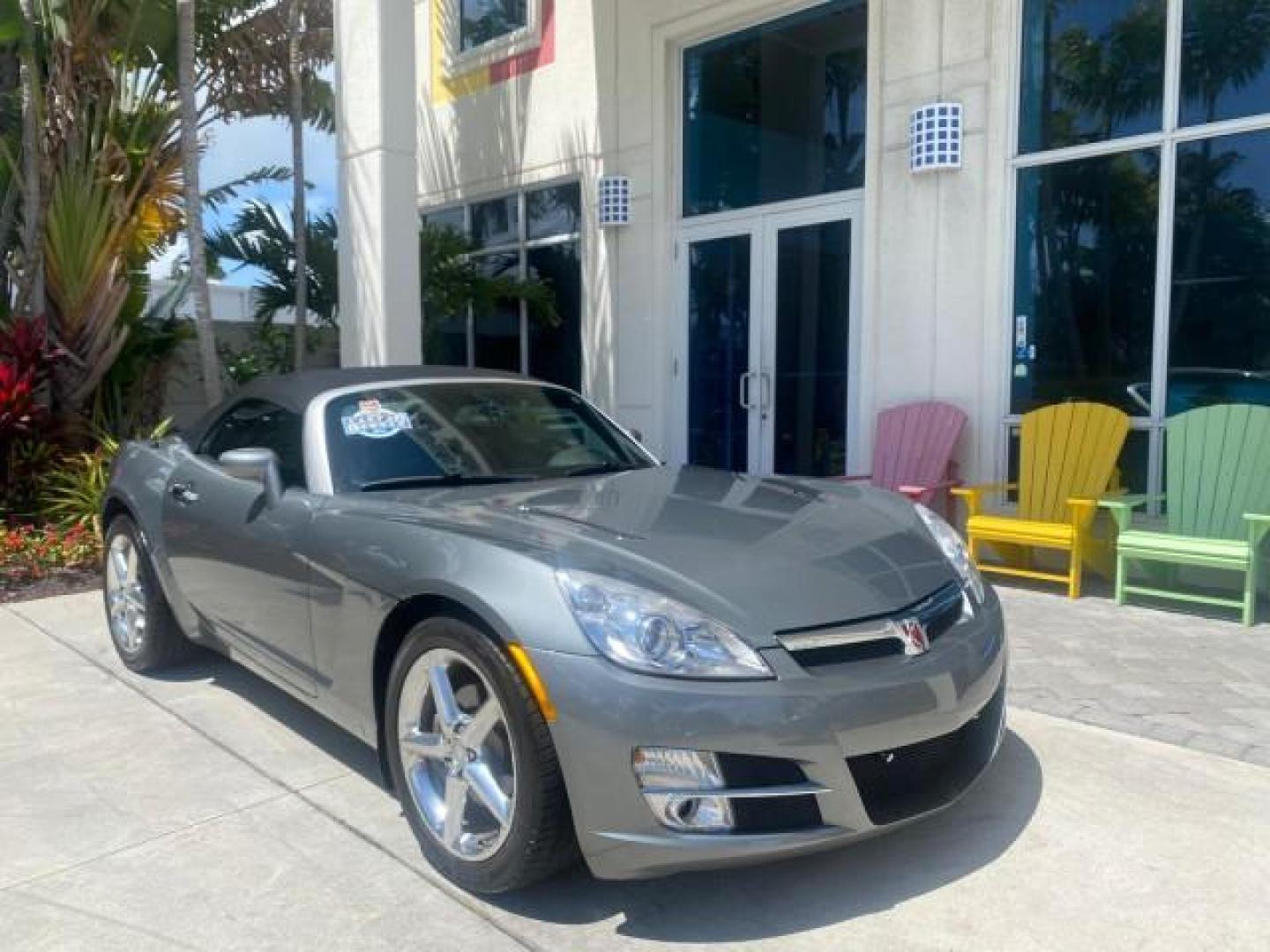 2007 Silver Graphite /Black Saturn Sky CONV LOW MILES 42,288 1 OWNER (1G8MB35B47Y) with an 2.4L DOHC VVT I4 Aluminum Ecotec Engine engine, Automatic transmission, located at 4701 North Dixie Hwy, Pompano Beach, FL, 33064, (954) 422-2889, 26.240938, -80.123474 - OUR WEBPAGE FLORIDACARS1.COM HAS OVER 100 PHOTOS AND FREE CARFAX LINK 2007 Saturn SKY 1 OWNER Convertible 2.4L I4 F DOHC Gasoline 28 MPG Rear Wheel Drive Features ABS Brakes Air Conditioning Alloy Wheels AM/FM Stereo Automatic Transmission Auxiliary Audio Input CD Audio Cruise Control Leather Seats - Photo#1