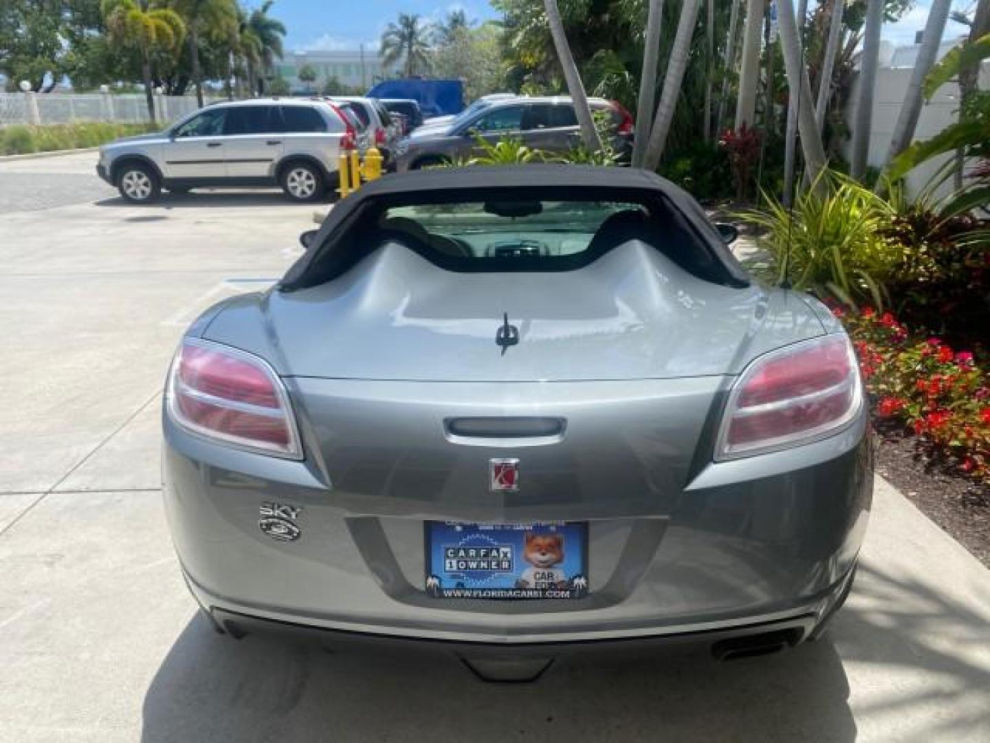 2007 Silver Graphite /Black Saturn Sky CONV LOW MILES 42,288 1 OWNER (1G8MB35B47Y) with an 2.4L DOHC VVT I4 Aluminum Ecotec Engine engine, Automatic transmission, located at 4701 North Dixie Hwy, Pompano Beach, FL, 33064, (954) 422-2889, 26.240938, -80.123474 - OUR WEBPAGE FLORIDACARS1.COM HAS OVER 100 PHOTOS AND FREE CARFAX LINK 2007 Saturn SKY 1 OWNER Convertible 2.4L I4 F DOHC Gasoline 28 MPG Rear Wheel Drive Features ABS Brakes Air Conditioning Alloy Wheels AM/FM Stereo Automatic Transmission Auxiliary Audio Input CD Audio Cruise Control Leather Seats - Photo#6