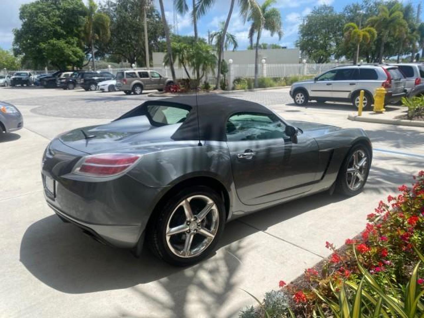 2007 Silver Graphite /Black Saturn Sky CONV LOW MILES 42,288 1 OWNER (1G8MB35B47Y) with an 2.4L DOHC VVT I4 Aluminum Ecotec Engine engine, Automatic transmission, located at 4701 North Dixie Hwy, Pompano Beach, FL, 33064, (954) 422-2889, 26.240938, -80.123474 - OUR WEBPAGE FLORIDACARS1.COM HAS OVER 100 PHOTOS AND FREE CARFAX LINK 2007 Saturn SKY 1 OWNER Convertible 2.4L I4 F DOHC Gasoline 28 MPG Rear Wheel Drive Features ABS Brakes Air Conditioning Alloy Wheels AM/FM Stereo Automatic Transmission Auxiliary Audio Input CD Audio Cruise Control Leather Seats - Photo#7