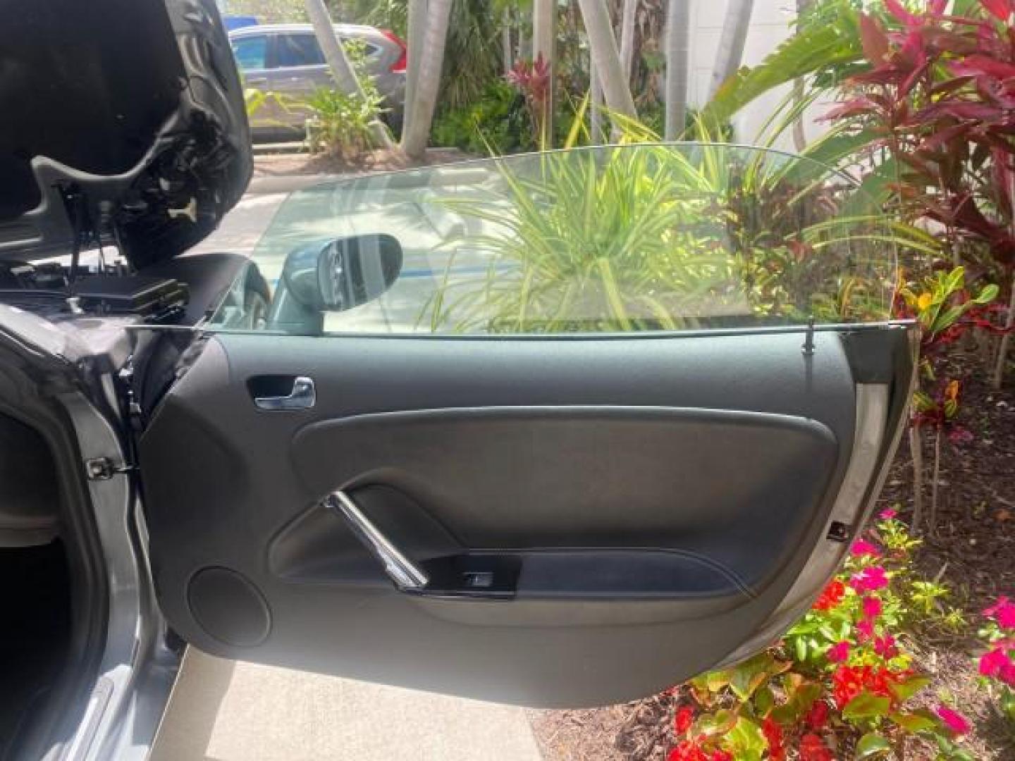 2007 Silver Graphite /Black Saturn Sky CONV LOW MILES 42,288 1 OWNER (1G8MB35B47Y) with an 2.4L DOHC VVT I4 Aluminum Ecotec Engine engine, Automatic transmission, located at 4701 North Dixie Hwy, Pompano Beach, FL, 33064, (954) 422-2889, 26.240938, -80.123474 - OUR WEBPAGE FLORIDACARS1.COM HAS OVER 100 PHOTOS AND FREE CARFAX LINK 2007 Saturn SKY 1 OWNER Convertible 2.4L I4 F DOHC Gasoline 28 MPG Rear Wheel Drive Features ABS Brakes Air Conditioning Alloy Wheels AM/FM Stereo Automatic Transmission Auxiliary Audio Input CD Audio Cruise Control Leather Seats - Photo#11