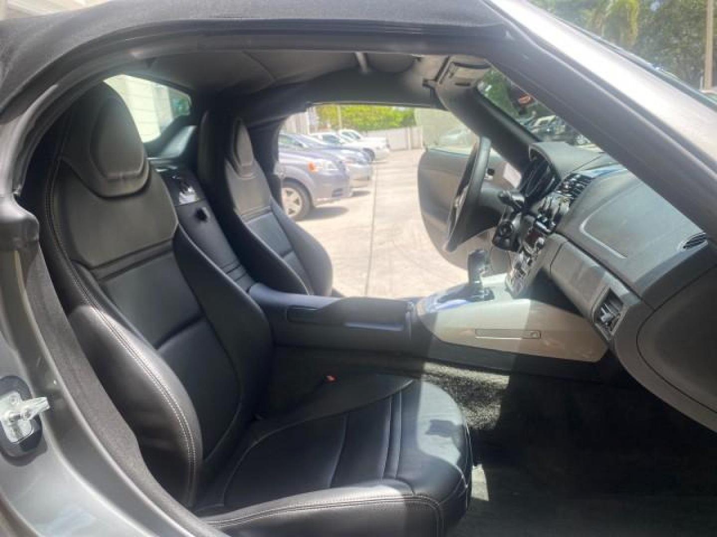2007 Silver Graphite /Black Saturn Sky CONV LOW MILES 42,288 1 OWNER (1G8MB35B47Y) with an 2.4L DOHC VVT I4 Aluminum Ecotec Engine engine, Automatic transmission, located at 4701 North Dixie Hwy, Pompano Beach, FL, 33064, (954) 422-2889, 26.240938, -80.123474 - OUR WEBPAGE FLORIDACARS1.COM HAS OVER 100 PHOTOS AND FREE CARFAX LINK 2007 Saturn SKY 1 OWNER Convertible 2.4L I4 F DOHC Gasoline 28 MPG Rear Wheel Drive Features ABS Brakes Air Conditioning Alloy Wheels AM/FM Stereo Automatic Transmission Auxiliary Audio Input CD Audio Cruise Control Leather Seats - Photo#12