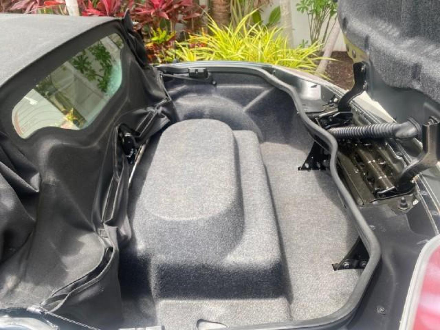 2007 Silver Graphite /Black Saturn Sky CONV LOW MILES 42,288 1 OWNER (1G8MB35B47Y) with an 2.4L DOHC VVT I4 Aluminum Ecotec Engine engine, Automatic transmission, located at 4701 North Dixie Hwy, Pompano Beach, FL, 33064, (954) 422-2889, 26.240938, -80.123474 - OUR WEBPAGE FLORIDACARS1.COM HAS OVER 100 PHOTOS AND FREE CARFAX LINK 2007 Saturn SKY 1 OWNER Convertible 2.4L I4 F DOHC Gasoline 28 MPG Rear Wheel Drive Features ABS Brakes Air Conditioning Alloy Wheels AM/FM Stereo Automatic Transmission Auxiliary Audio Input CD Audio Cruise Control Leather Seats - Photo#14