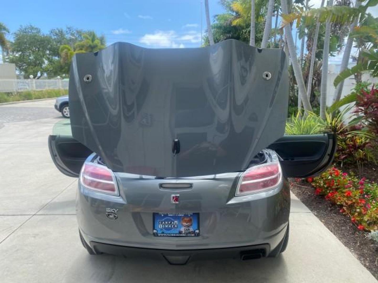 2007 Silver Graphite /Black Saturn Sky CONV LOW MILES 42,288 1 OWNER (1G8MB35B47Y) with an 2.4L DOHC VVT I4 Aluminum Ecotec Engine engine, Automatic transmission, located at 4701 North Dixie Hwy, Pompano Beach, FL, 33064, (954) 422-2889, 26.240938, -80.123474 - OUR WEBPAGE FLORIDACARS1.COM HAS OVER 100 PHOTOS AND FREE CARFAX LINK 2007 Saturn SKY 1 OWNER Convertible 2.4L I4 F DOHC Gasoline 28 MPG Rear Wheel Drive Features ABS Brakes Air Conditioning Alloy Wheels AM/FM Stereo Automatic Transmission Auxiliary Audio Input CD Audio Cruise Control Leather Seats - Photo#15